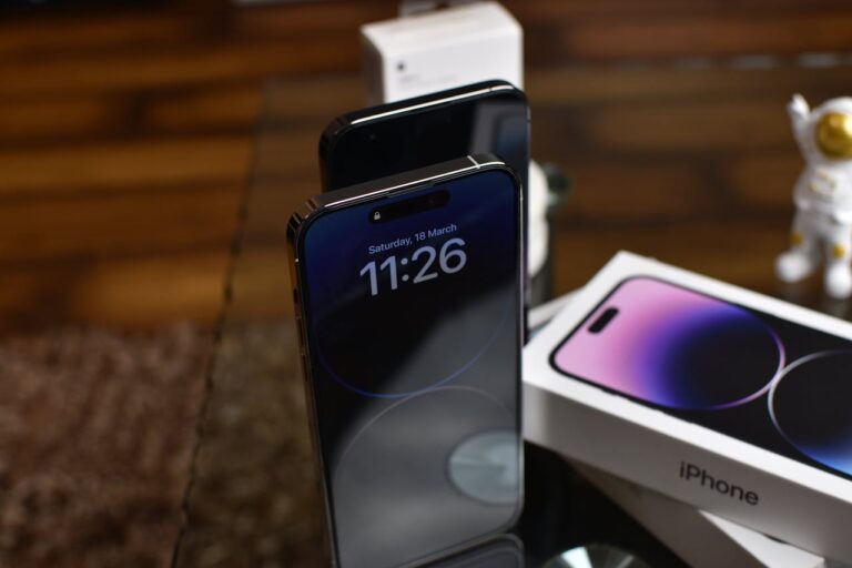 A phone and box placed on a surface