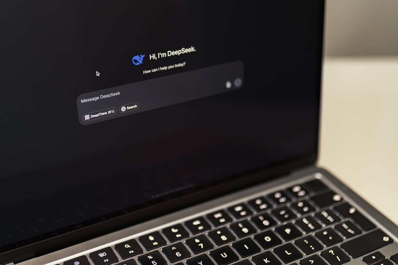 MacBook with DeepSeek AI Interface Displayed