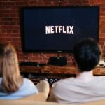 A couple watching Netflix.