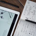 Photo Of Pen On Top Of Notebook