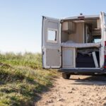 White and Brown Camper Trailer on Brown Field