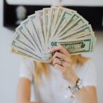 Dollars currency in hands