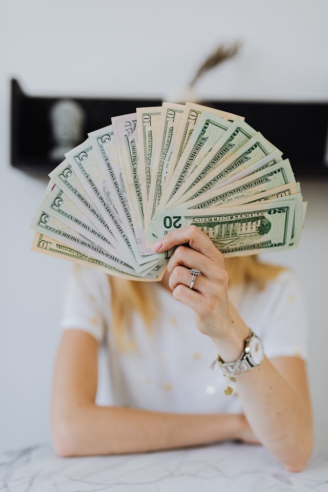 Dollars currency in hands