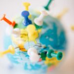 Pins on world map.