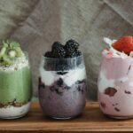 Fresh fruits with yogurt in a clear glass