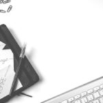 Pen on a Black Journal Book