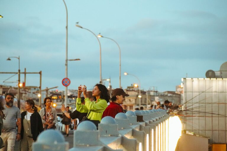 Street Scene with Tourists in Urban Setting at Twilight