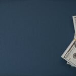 Dollars on Blue Surface