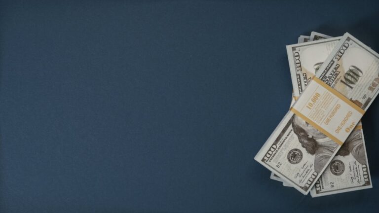 Dollars on Blue Surface