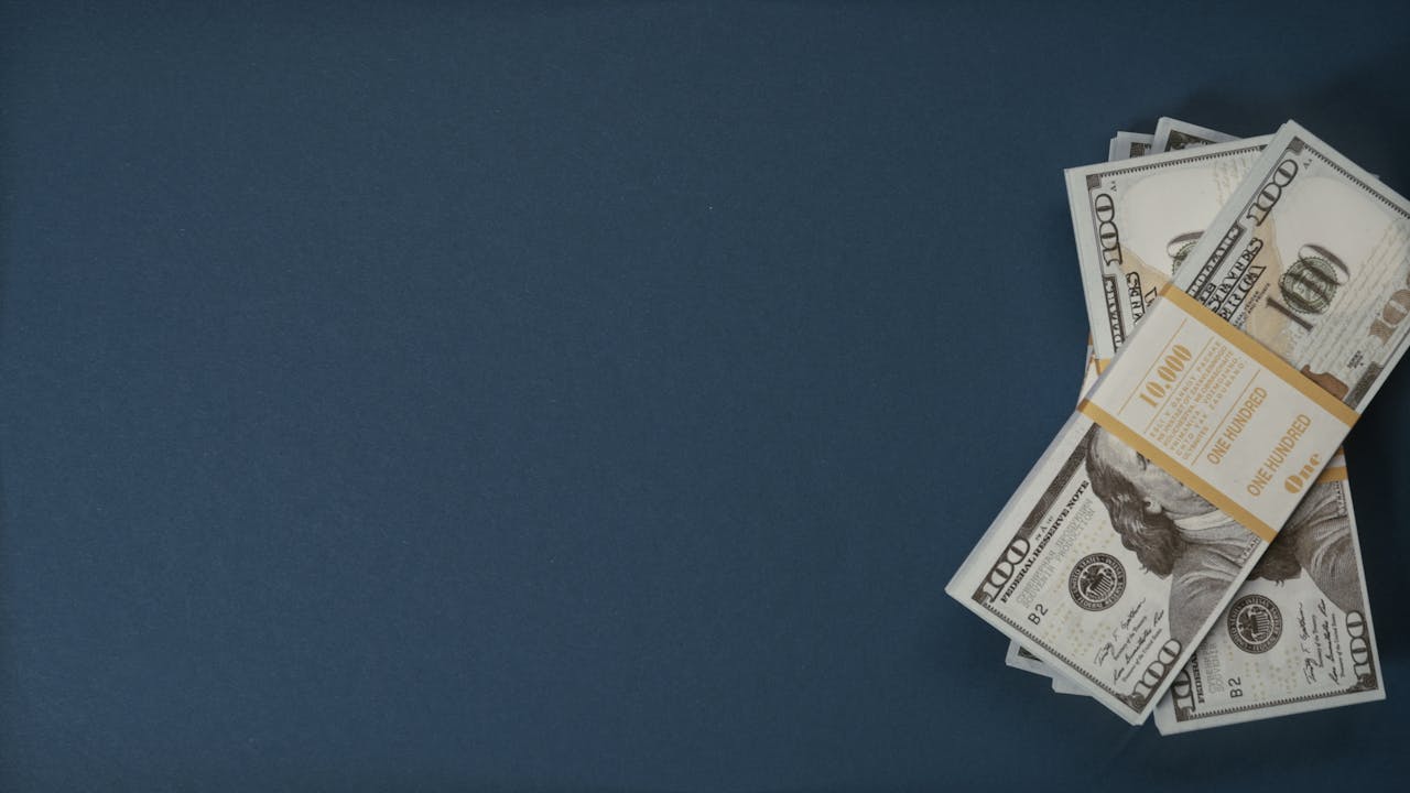 Dollars on Blue Surface
