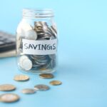 Clear Glass Jar With Silver Coins