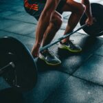 Person Holding Barbell