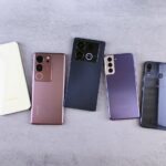 Five Smartphones on a Gray Background