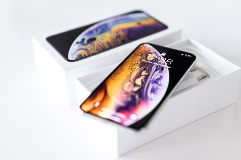 Phone placed on a box.