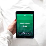 A Person Holding a Digital Tablet