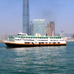 Modern City and Ferry on Water