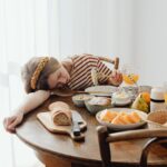 A Girl Eating Breakfast