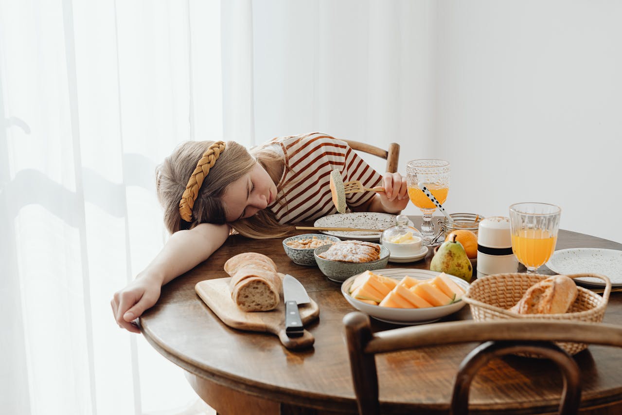 A Girl Eating Breakfast