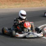 A Man Driving a Go Kart