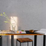 Brown Wooden Table With White Printer Paper on Top