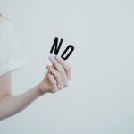 Person Holding an Alphabet